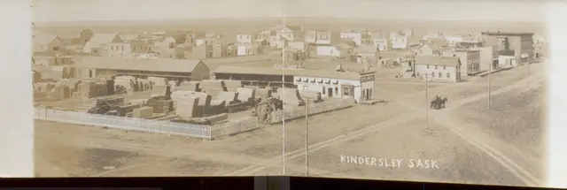 Panoramic view of Kindersley with lumberyard and town streets